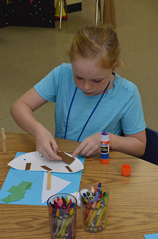 Child Working on Craft