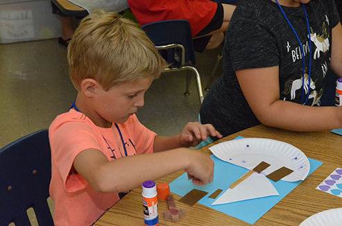 Child Working on Craft