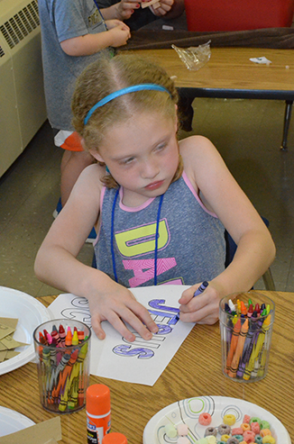 Child Working on Craft