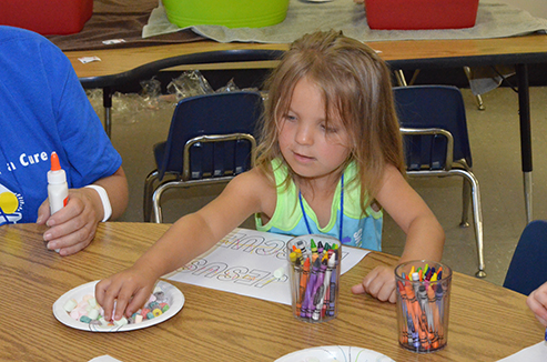 Child Working on Craft