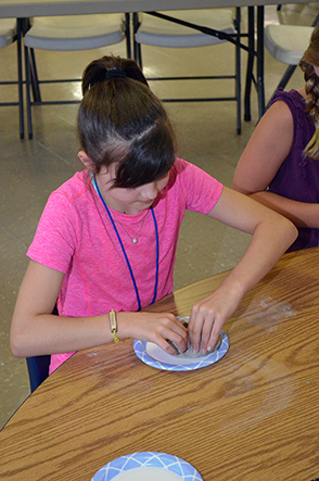 Child Working with Clay