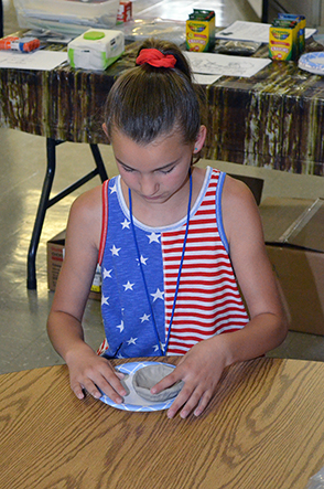 Child Working with Clay