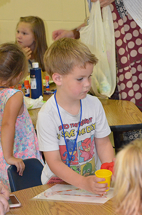 Child Working on Craft