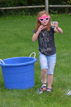 Child Walking with Glass of Water