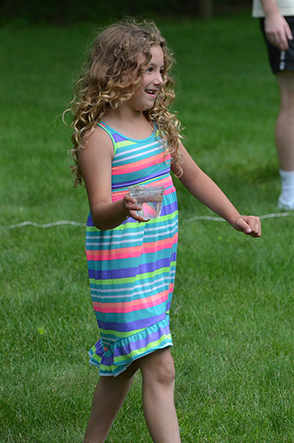 Child Walking with Glass of Water