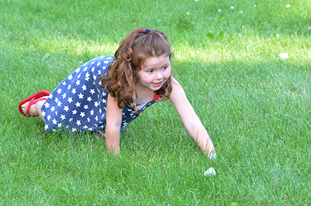 Child Searching for the Right Scented Cotton Ball