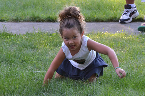 Child Searching for the Right Scented Cotton Ball