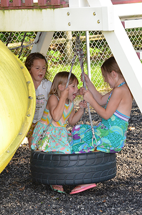 Children on Tire Swing