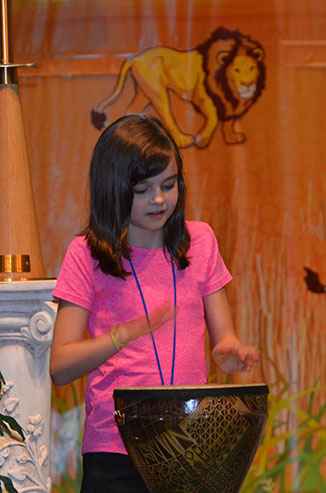 Child Playing Bongo Drum